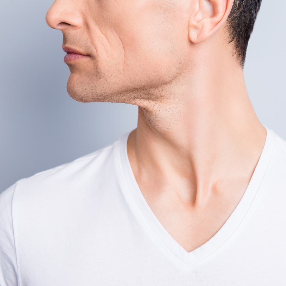 Cropped, close up profile, side view half face portrait of trendy, neat, experienced, stylish, brunet man with perfect oiled dry skin, isolated on grey background
