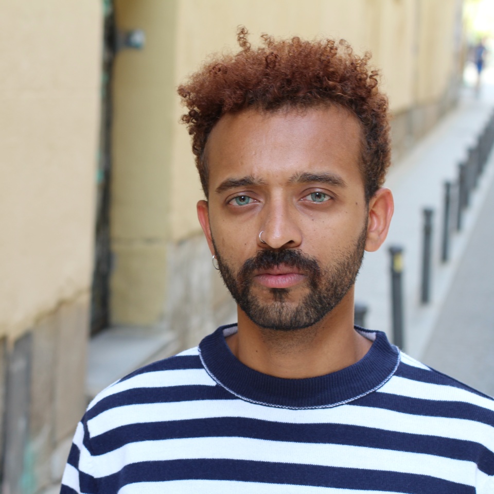 Handsome afro man with blue eyes