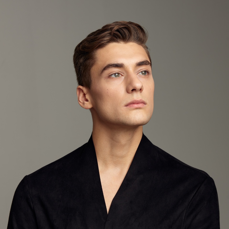 handsome man fashion hairstyle glamor attractive look close-up