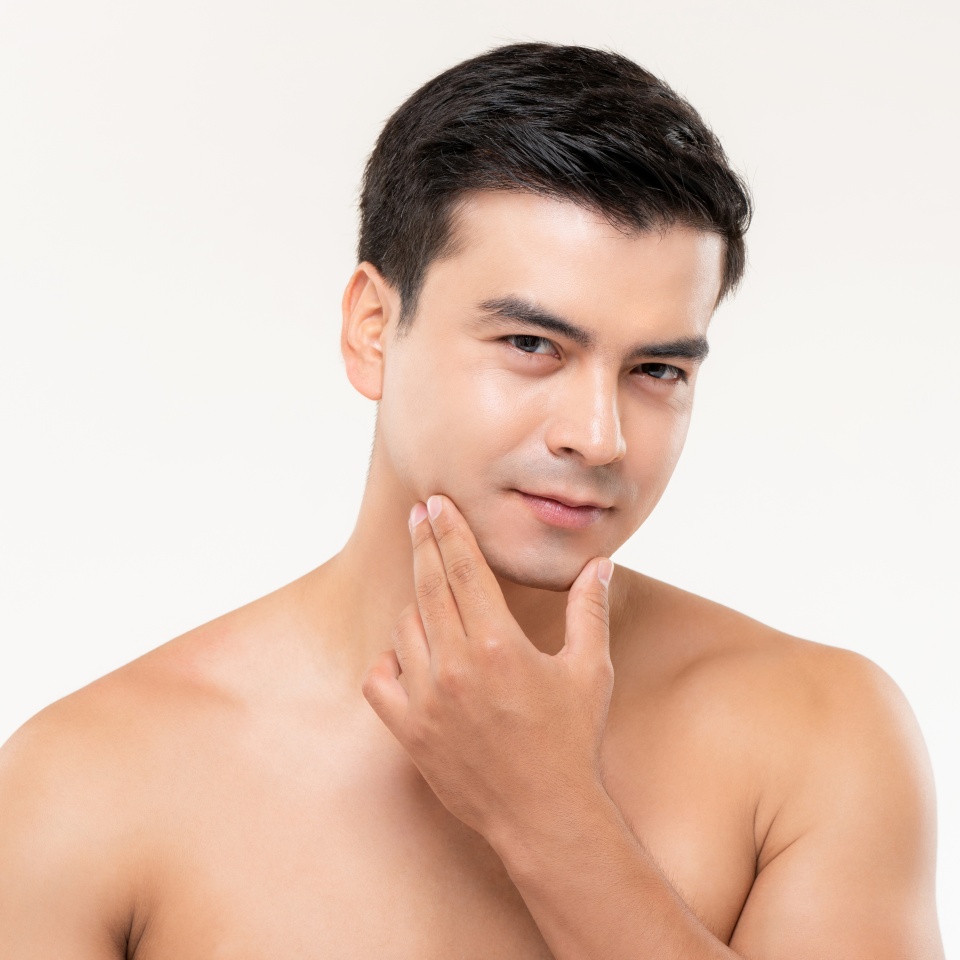 Male beauty and skin care portrait in isolated white background
