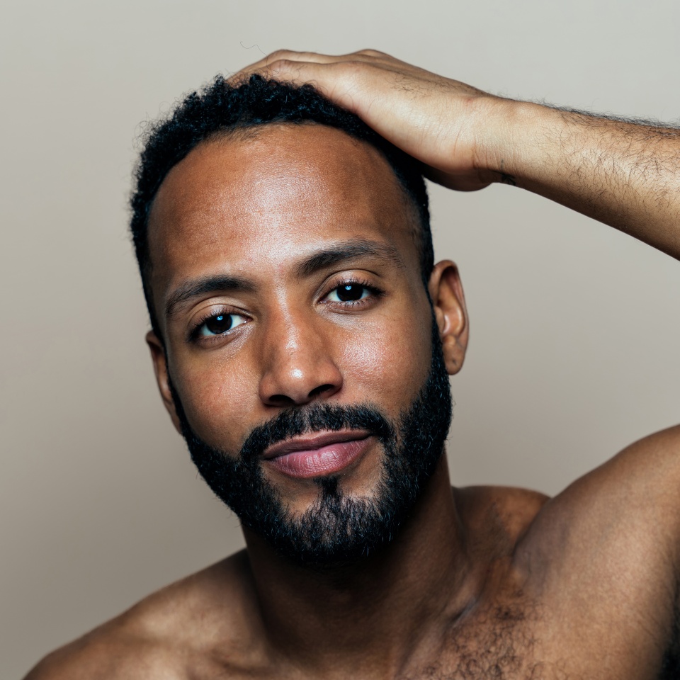 Image of a young man taking care of his skin. Beauty studio shot about skin care and products for the personal hygiene.