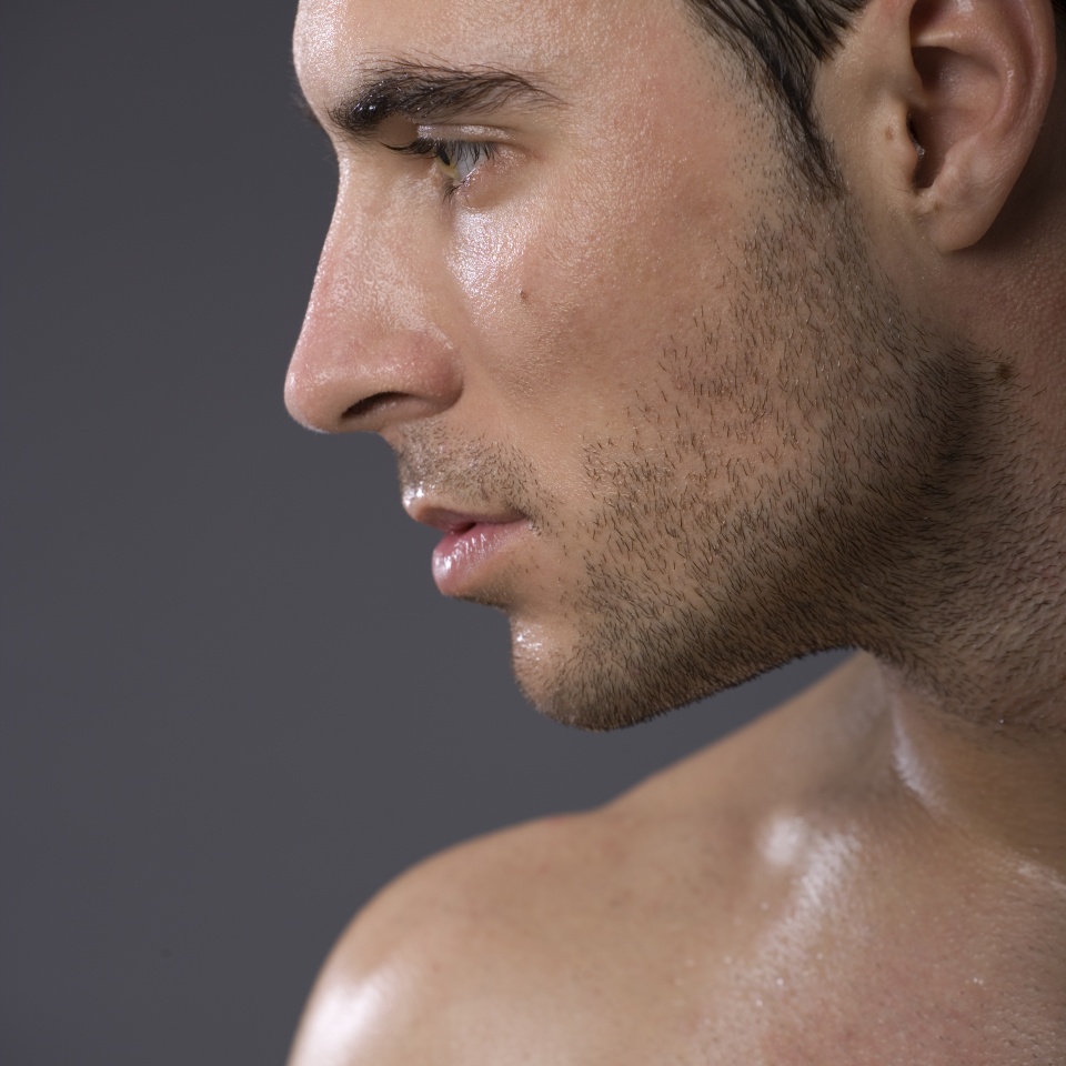 Male profile on gray background