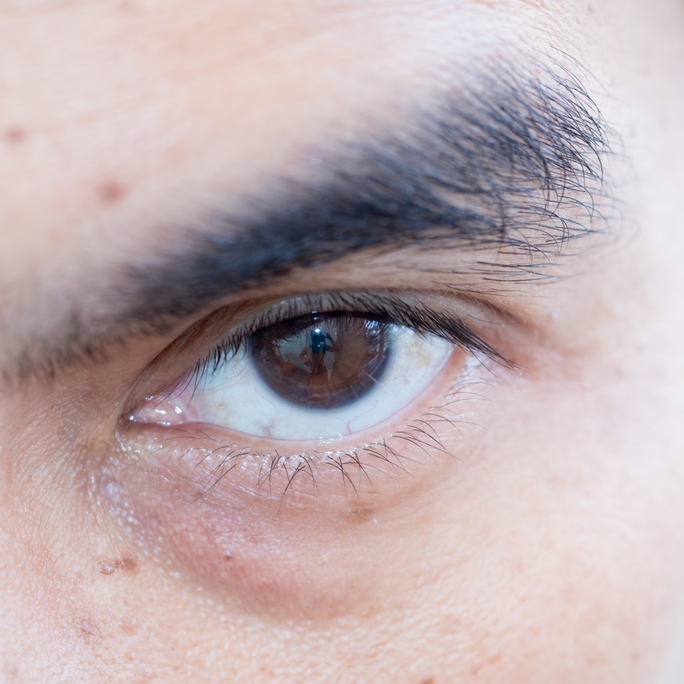 Closeup The eyes of an Asian young man